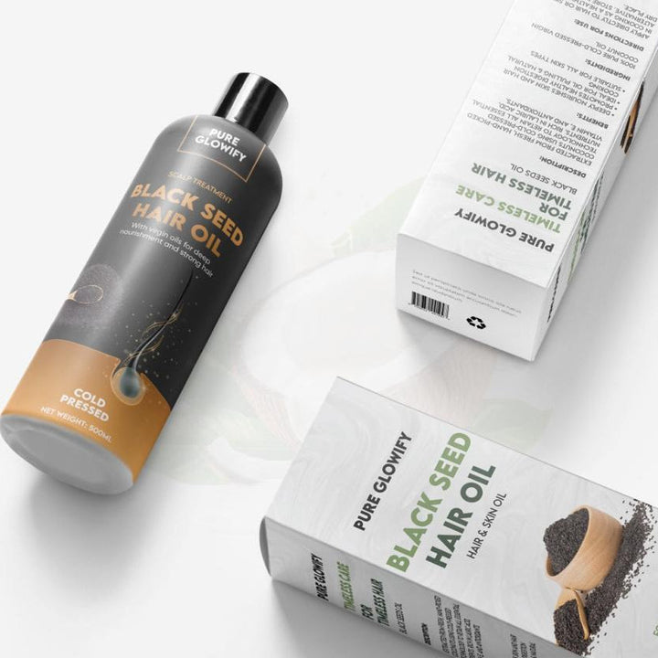 Black Seed Hair Oil bottle and packaging on a white background